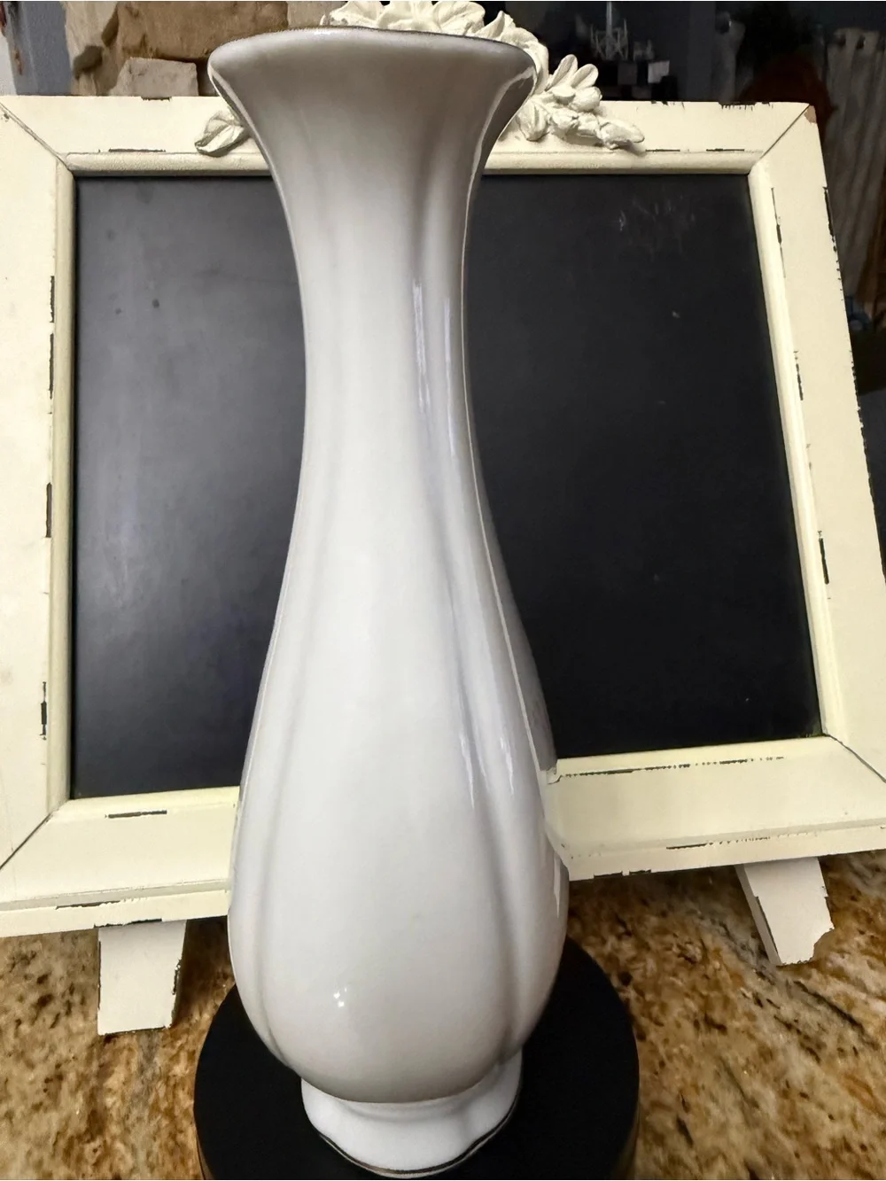 Delicate White Vase with Pastel Pink and Blue Floral Motif